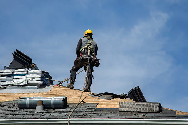 Professional Roofing technician working in Sharon, MA